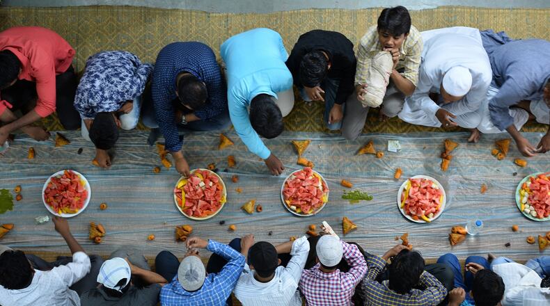 Muslims breaking their Ramadan fast with 'iftar'.