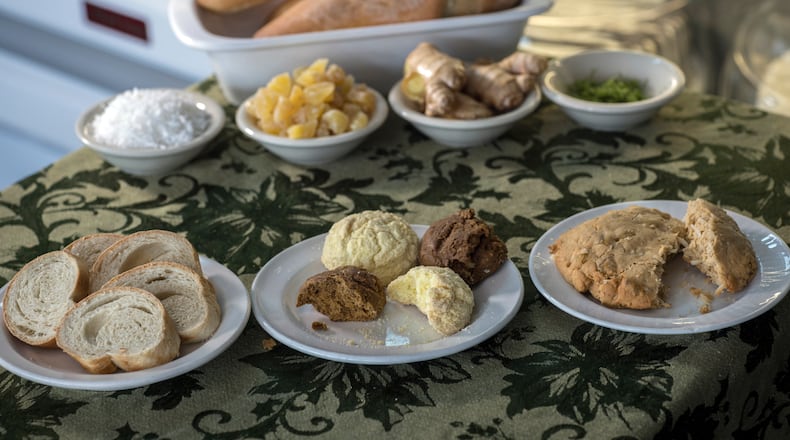 Savannah's Unforgettable Bakery and Café, which is owned by Haitian native Belinda Baptiste, creates items such as vegan Bon Bon Sirop and a gluten-free Bon Bon Amidon, shown together (center, front row), along with Komparét (right, front row) and a Haitian baguette (left, front row). (Stephen B. Morton for The Atlanta Journal-Constitution)