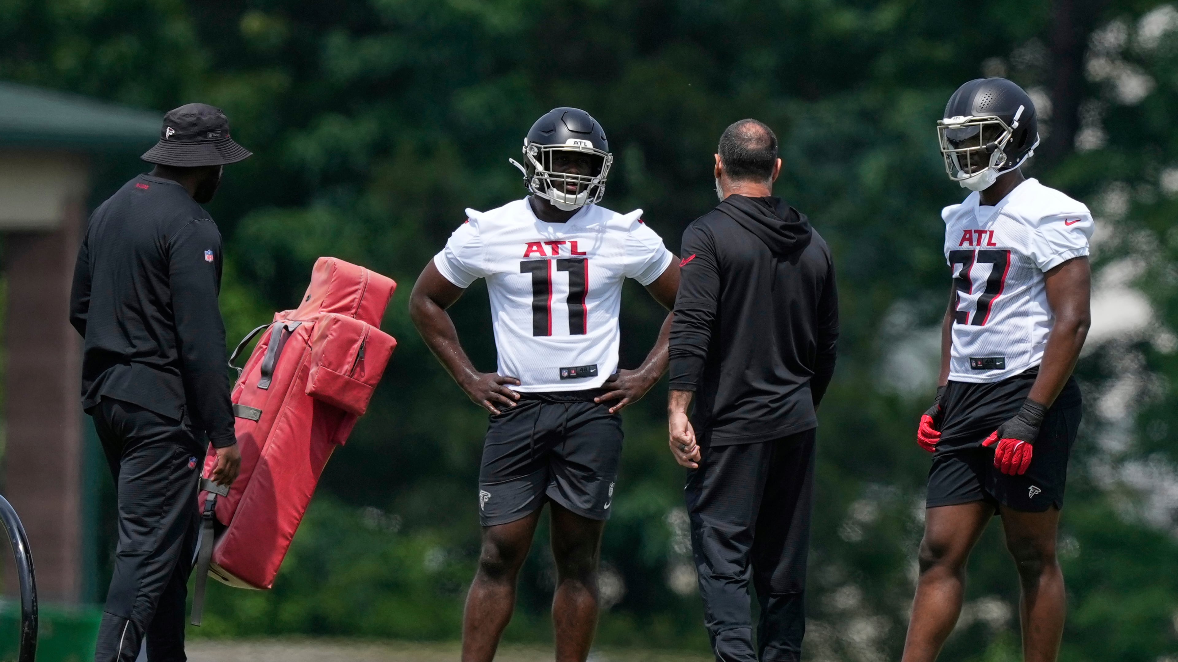 Atlanta Falcons edge rushers Jalon Walker (left) and James Pearce Jr. are part of the team's reconstructed defense. (Brynn Anderson/AP)