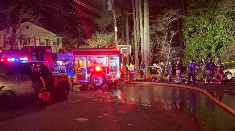 First responders got the call about a structure fire on Wilder Court around 3:45 a.m. Sunday, Dunwoody police said. Officers were first to arrive and fund one resident outside while another was trapped inside the house.