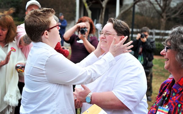 FILE - Same sex couples from Madison and surrounding counties celebrate as they get their marriage licenses and get married in Huntsville, Ala., Feb. 9, 2015, during a Wedding Week Huntsville event honoring the legalization of same-sex marriage. (Sarah Cole/The Huntsville Times via AP, File)