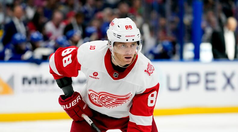 FILE - Detroit Red Wings right wing Patrick Kane (88) against the Tampa Bay Lightning during the third period of an NHL hockey game Monday, April 13, 2026, in Tampa, Fla. (AP Photo/Chris O'Meara,File)