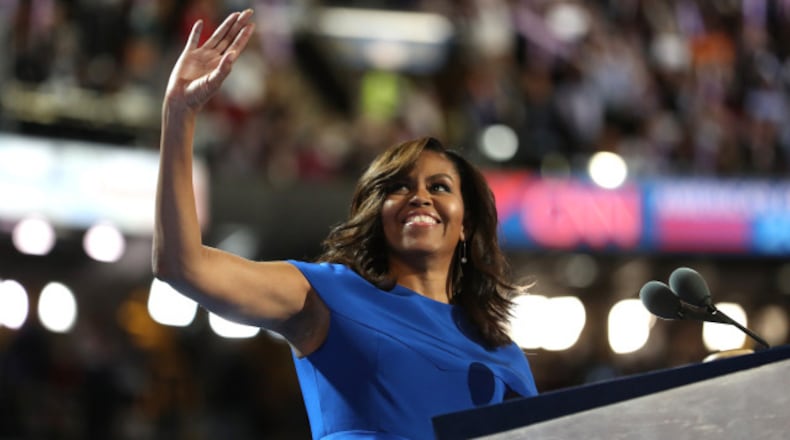 First lady Michelle Obama acknowledges the crowd after delivering remarks on the first day of the Democratic National Convention at the Wells Fargo Center, July 25, 2016 in Philadelphia, Pennsylvania. The four-day Democratic National Convention kicked off July 25. (Photo by Joe Raedle/Getty Images)