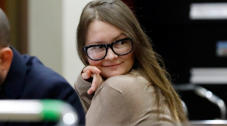 Anna Sorokin sits at the defense table in New York State Supreme Court, in New York, Wednesday, March 27, 2019. Sorokin, who claimed to be a German heiress, is on trial on grand larceny and theft of services charges.