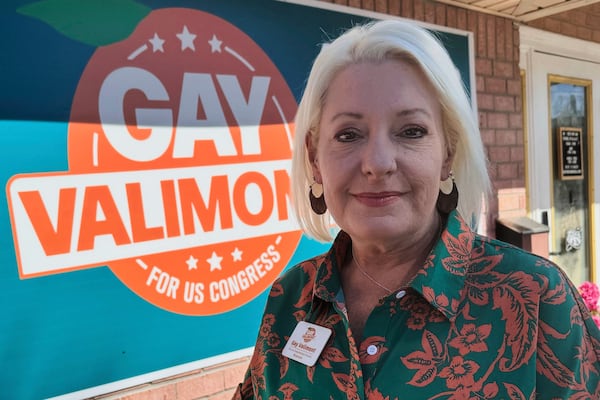 FILE - Democratic candidate Gay Valimont poses for a portrait outside her campaign office in Pensacola, Fla. on March 17, 2025. (AP Photo/Kate Payne, File)