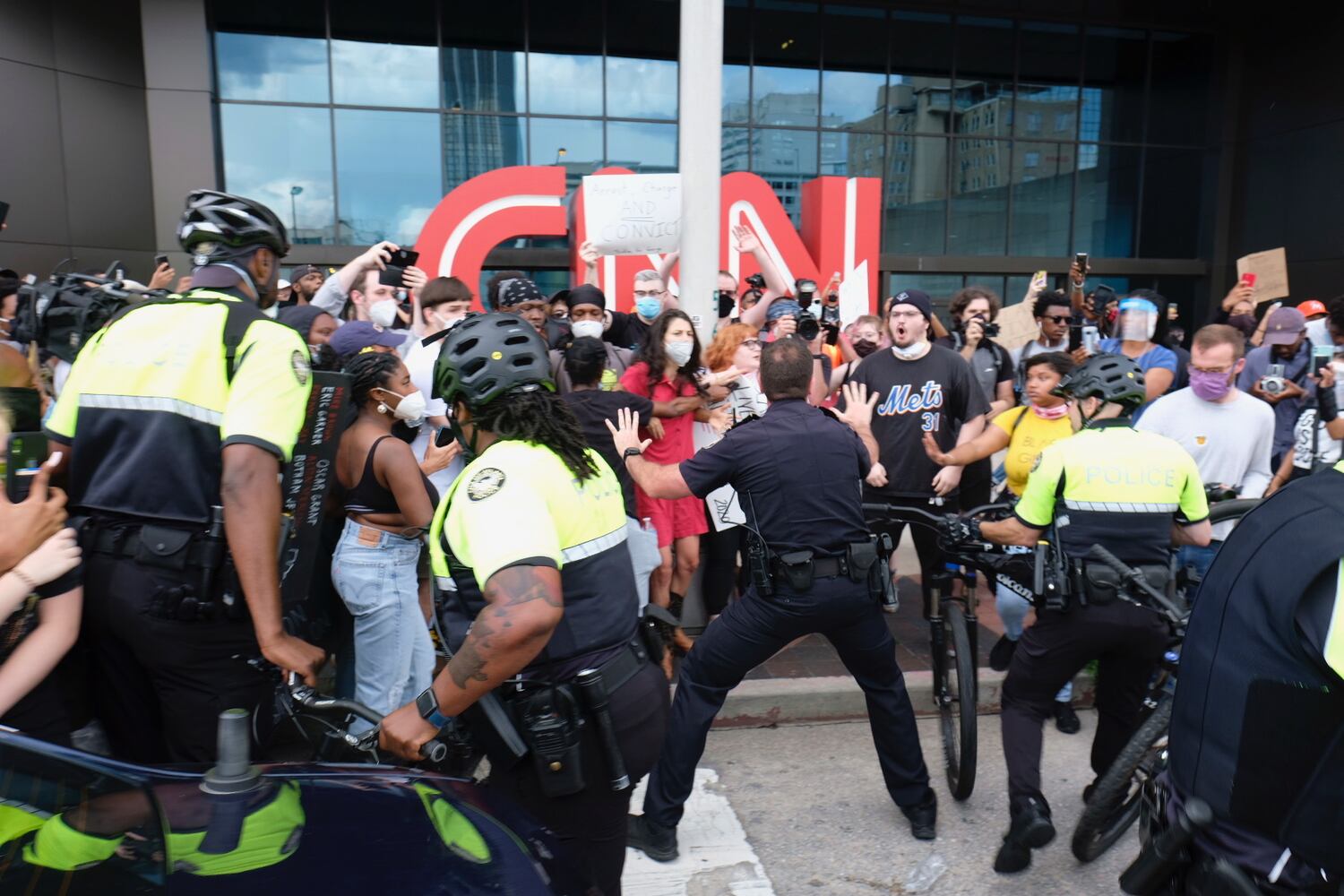 Behind the lens --  Protests: Taken FOR THE AJC