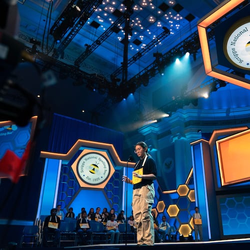 Victoria Li, 12, of Eastvale, Calif., spells his word during the preliminary round of the Scripps National Spelling Bee at DAR Constitution Hall, Tuesday, May 26, 2026, in Washington. (AP Photo/Jose Luis Magana)