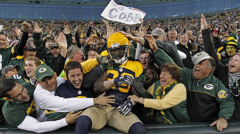 Green Bay Packers wide receiver James Jones celebrates a touchdown reception against the San Diego Chargers with a Lambeau Leap during an NFL football game Sunday Oct. 18, 2015, in Green Bay, Wis. (AP Photo/Matt Ludtke)