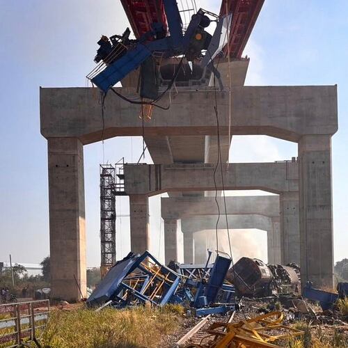 This photo released from State Railway of Thailand, shows a scene after a construction crane fell into a passenger train in Nakhon Ratchasima province, Thailand Wednesday, Jan. 14, 2026. (State Railway of Thailand via AP)