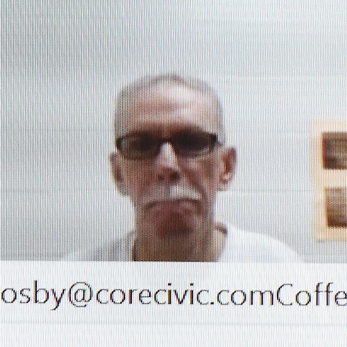 Dennis Perry watched and listened remotely during a hearing for a new trial in the murder case in which he was found guilty two decades ago on July 13, 2020. Ryon Horne/RHORNE@AJC.COM