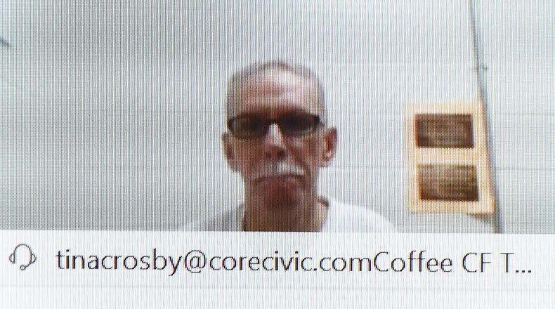 Dennis Perry watched and listened remotely during a hearing for a new trial in the murder case in which he was found guilty two decades ago on July 13, 2020. Ryon Horne/RHORNE@AJC.COM