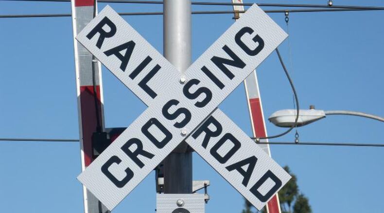 An Austell man was killed Monday morning while crossing a railroad track in a motorized wheelchair, police said.