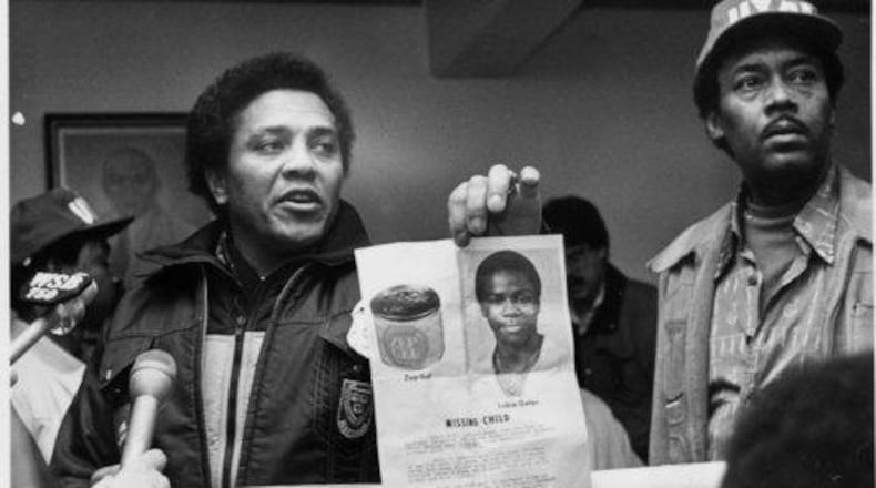 AJC File PhotoAt the West Hunter Street Baptist Church, Atlanta Police Chief Eldrin Bell holds up a photo of missing child, Lubie 'Chuck' Geter in this 1981 photo