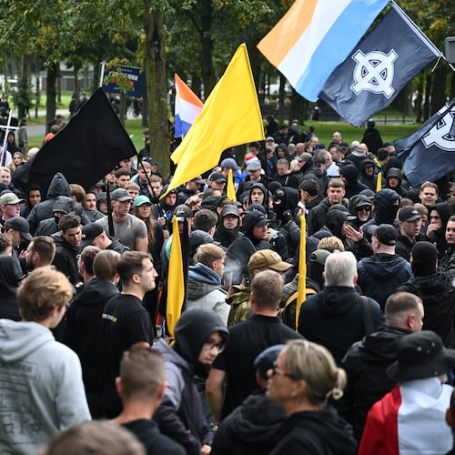 Protesters attend a far-right groups' protest against immigration and asylum policies, in The Hague, Netherlands, Saturday, Sept. 19, 2026. (AP Photo/Mouneb Taim)