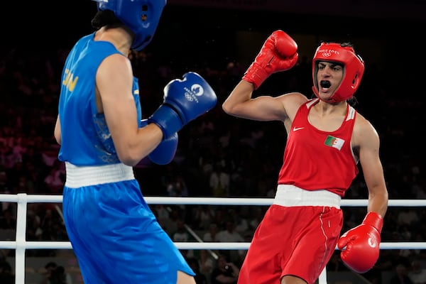 FILE -Algeria's Imane Khelif, right, fights China's Yang Liu in their women's 66 kg final boxing match at the 2024 Summer Olympics,, Aug. 9, 2024, in Paris, France. (AP Photo/Ariana Cubillos, File)