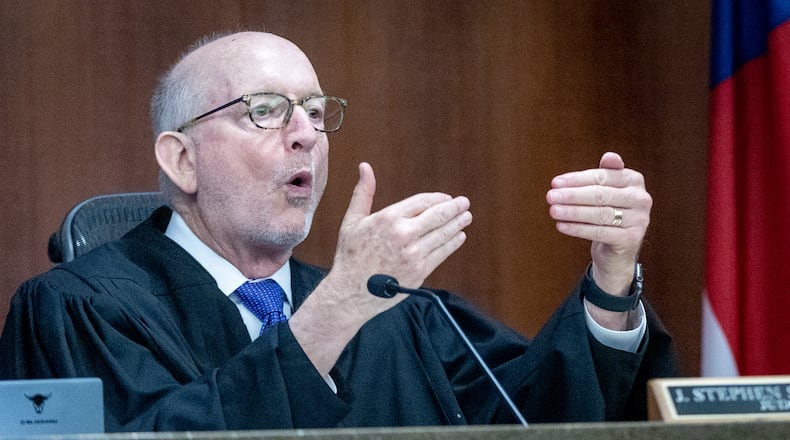 Judge Stephen J. Schuster talks to people in the courtroom during a hearing against the North Ga Conference of the United Methodist Church in Marietta Tuesday, May 16, 2023. (Steve Schaefer/steve.schaefer@ajc.com)