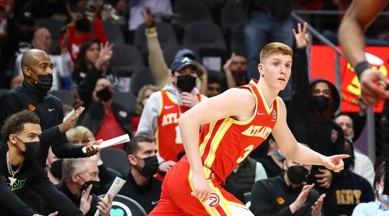 Hawks guard Kevin Huerter left Friday's win over the Wizards with a shoulder injury and is listed as a game-time decision for Monday's game in Detroit. (AJC file photo/ccompton@ajc.com)