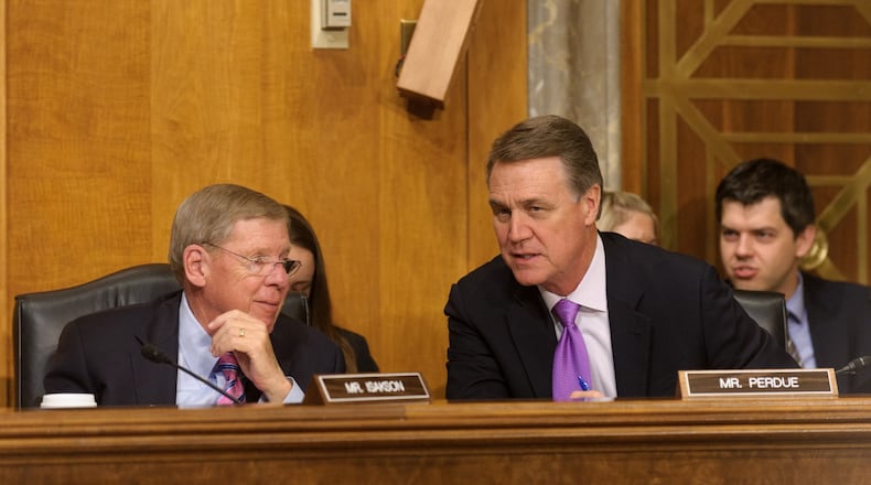 Georgia U.S. Sens. Johnny Isakson (left) and David Perdue (right) at a Foreign Relations Committee hearing on Capitol Hill in June 2015. Courtesy of the Senate Photography office.