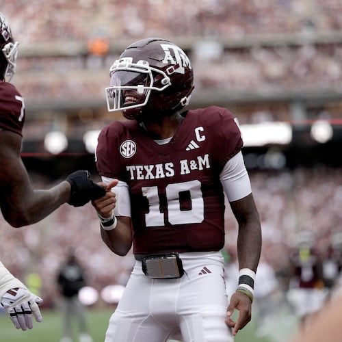 Texas A&M quarterback Marcel Reed (10) reacts with teammate Isaiah Horton (7) after a touchdown against Missouri State during the first quarter of an NCAA college football game Saturday, Sept. 5, 2026, in College Station, Texas. (AP Photo/Sam Craft)