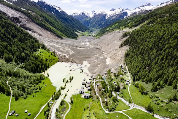 An aerial view shows the destruction of Blatten, Switzerland, Thursday, May 29, 2025, one day after a massive debris avalanche, triggered by the collapse of the Birch Glacier, swept down to the valley floor and demolished large parts of the village. (Jean-Christophe Bott/Keystone via AP)