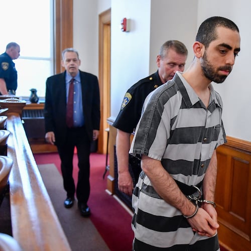 FILE - Hadi Matar walks in to the Chautauqua County court in Mayville, N.Y., May, 16, 2025. (AP Photo/Adrian Kraus, File)