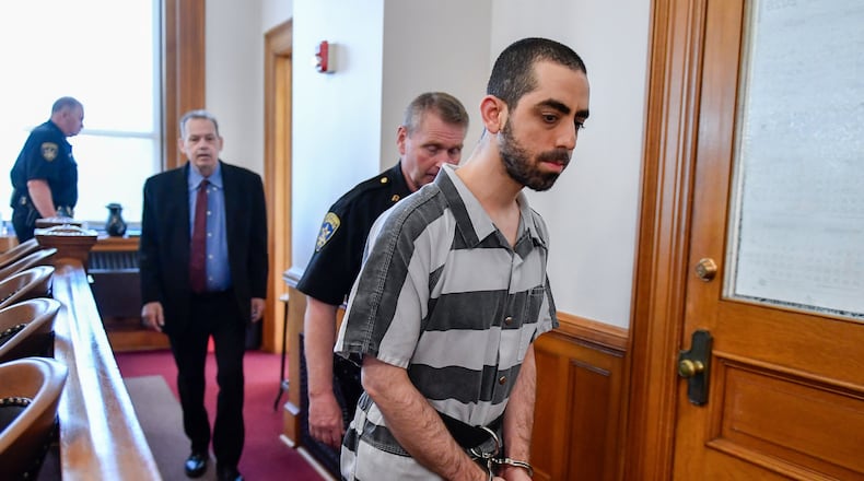 FILE - Hadi Matar walks in to the Chautauqua County court in Mayville, N.Y., May, 16, 2025. (AP Photo/Adrian Kraus, File)
