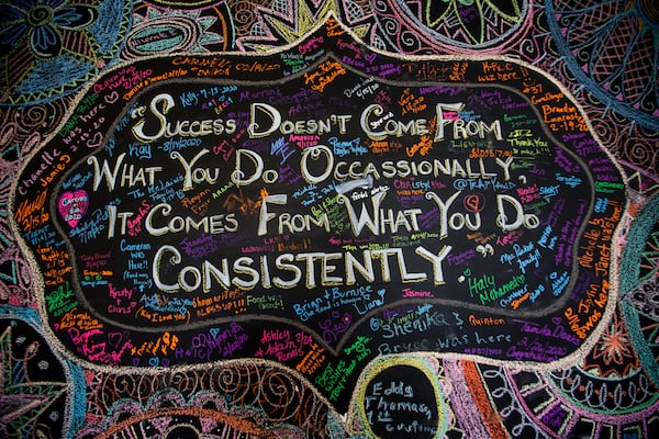 Affirmations and encouragement decorate the Reggae Vybz restaurant. Co-owner Chandra Johnson says, “April was really slow and we started seeing a little more traffic in June. But it’s still slow. You might have some days when you don’t get hardly any traffic.”  (Jenni Girtman for The Atlanta Journal-Constitution)