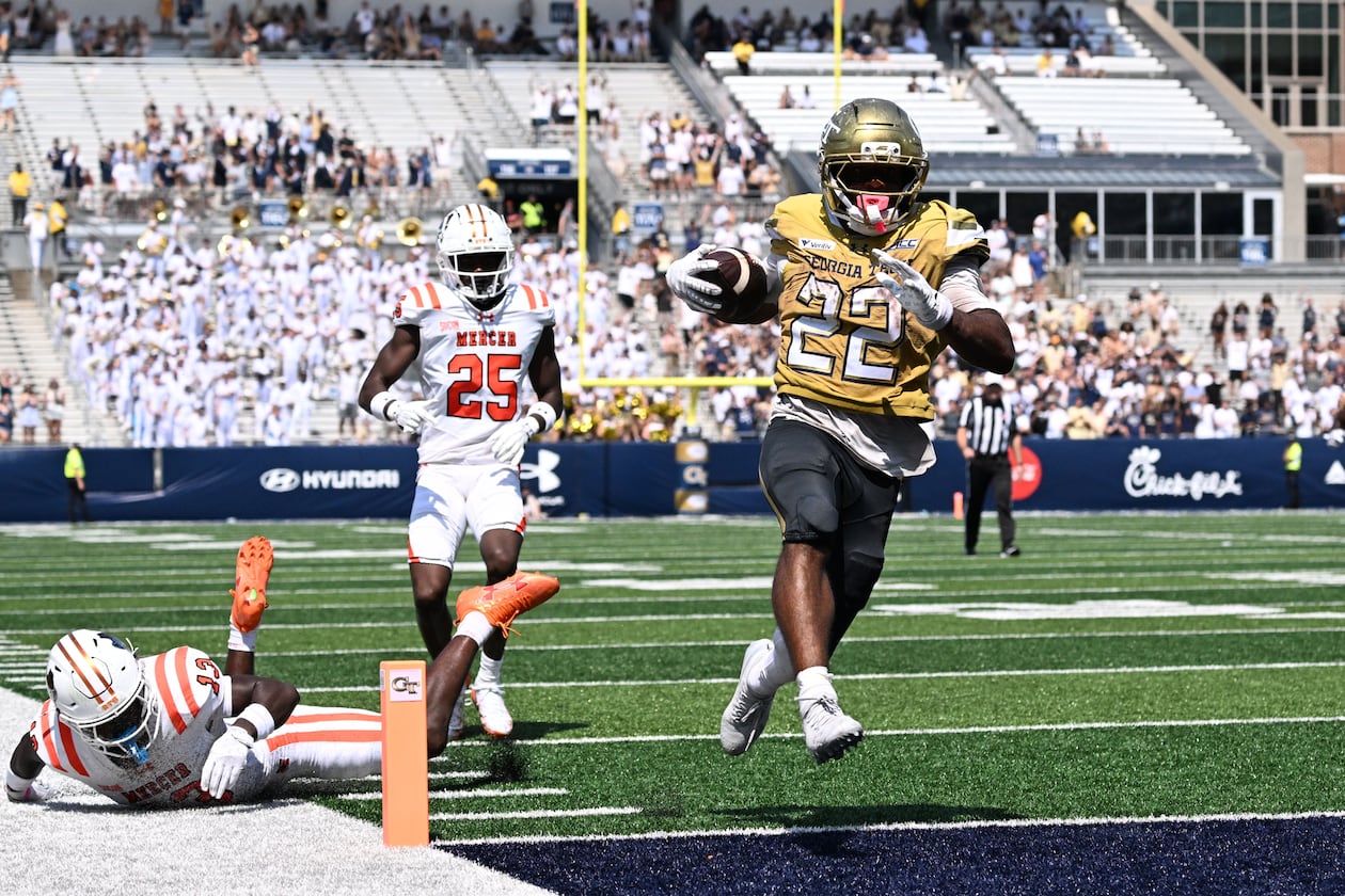 Georgia Tech running back Justice Haynes (22) scores a touchdown during the second half in an NCAA college football game at Bobby Dodd Stadium on Saturday, Sept. 19, 2026, in Atlanta. Georgia Tech won 44-11 over Mercer. (Hyosub Shin/AJC)