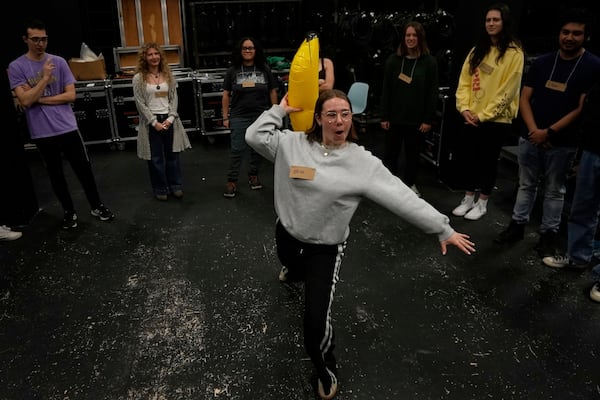 Erin Grant improvises during a creative climate communication class Thursday, March 20, 2025, in Boulder, Colo. (AP Photo/Brittany Peterson)