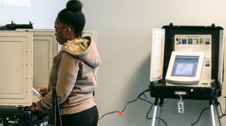 02/25/2019 -- Lawrenceville, Georgia -- A Gwinnett County resident participates in a special voting during early voting at the Gwinnett County Board of Voter Registrations and Elections building in Lawrenceville, Monday, February 25, 2019. The special ballot asks Gwinnett County residence to approve or disapprove a contract for provisions to expand public transportation to the county. (ALYSSA POINTER/ALYSSA.POINTER@AJC.COM)