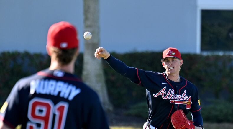Braves pitcher Hurston Waldrep (right) — pictured throwing during spring training Tuesday, Feb. 10, 2026, in North Port, Fla. — is scheduled to have surgery to remove loose bodies from his pitching elbow. (Hyosub Shin/AJC)