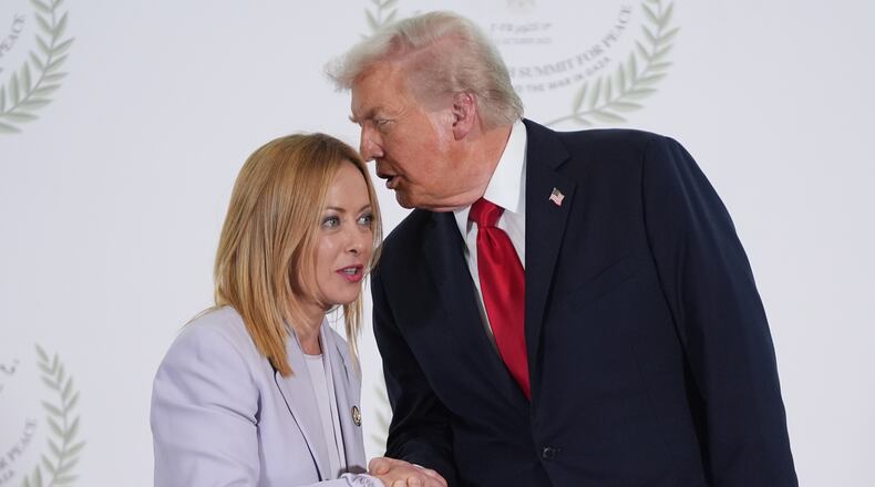 FILE -President Donald Trump greets Italy's Prime Minister Giorgia Meloni during summit to support ending the more than two-year Israel-Hamas war in Gaza after a breakthrough ceasefire deal, Oct. 13, 2025, in Sharm El Sheikh, Egypt. (AP Photo/Evan Vucci, Pool, File)