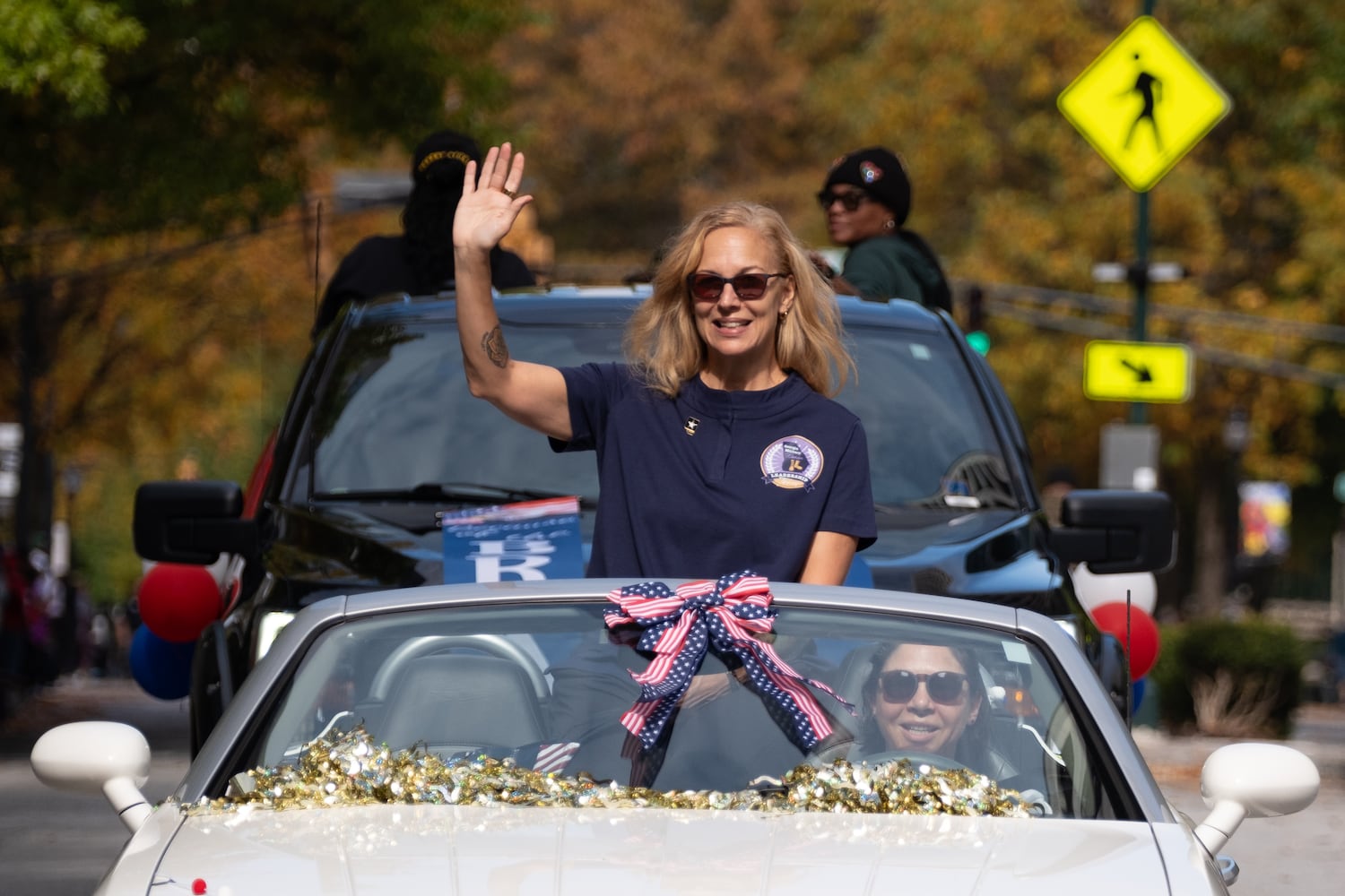 Retired Army Lt. Col. Raquel Durden, who was named the Georgia Woman Veteran of the Year, People rides in the Georgia Veterans Day Parade in Midtown Atlanta on Saturday, Nov. 8, 2025.   Ben Gray for the Atlanta Journal-Constitution