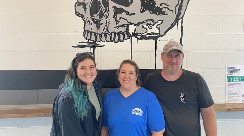 Tori Shari (from left), Aimee Shari and Jon Shari are the family behind Little Cottage Brewery in Avondale Estates. (Bob Townsend for The Atlanta Journal-Constitution)