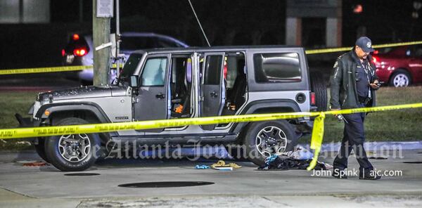 This gray Jeep was part of Tuesday's investigation outside a Citgo, where a woman was found in critical condition.