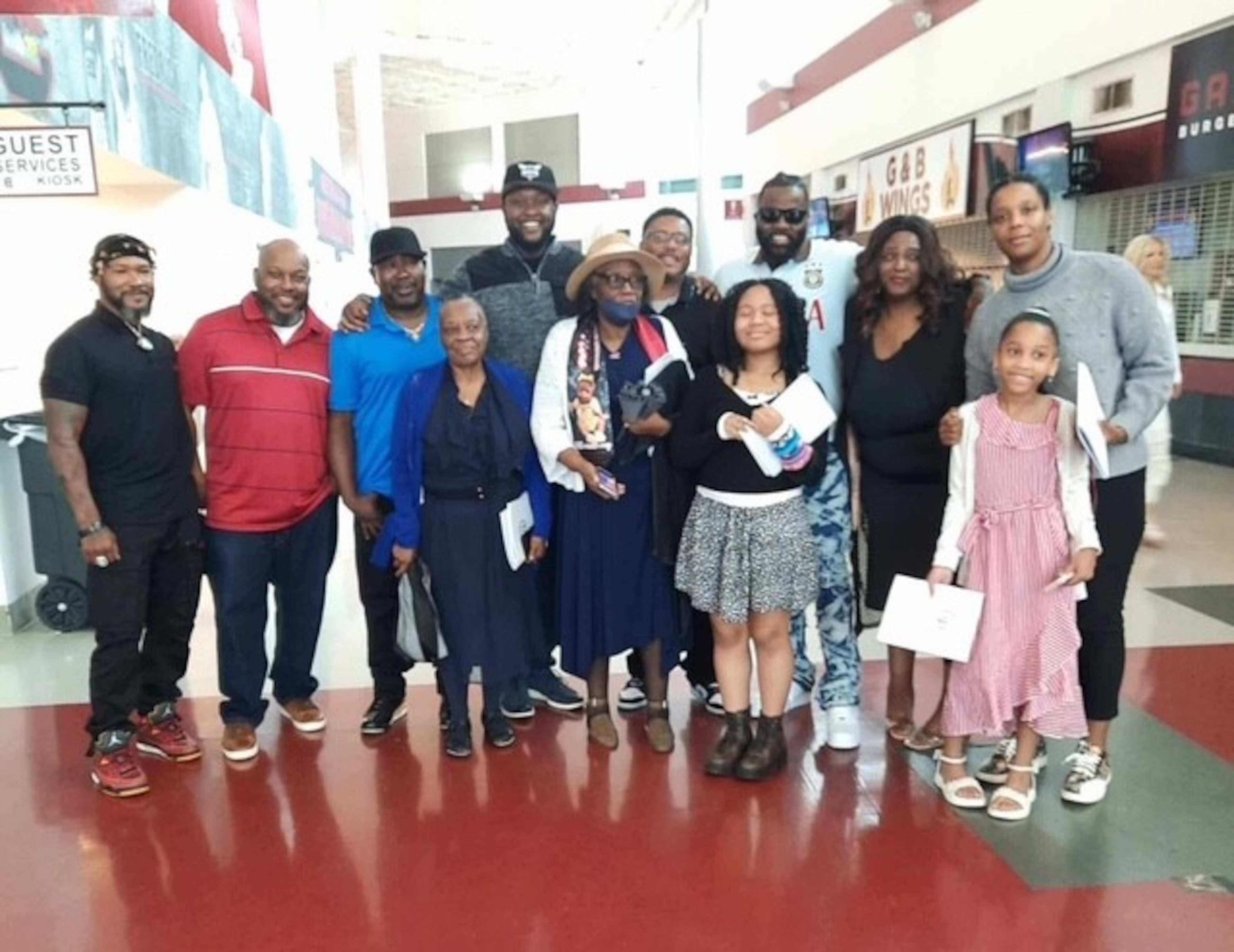 Former Falcons defensive lineman John Abraham's family, including his mother, Maggie Abraham (age 76), came out to support him at his graduation from the University of South Carolina.