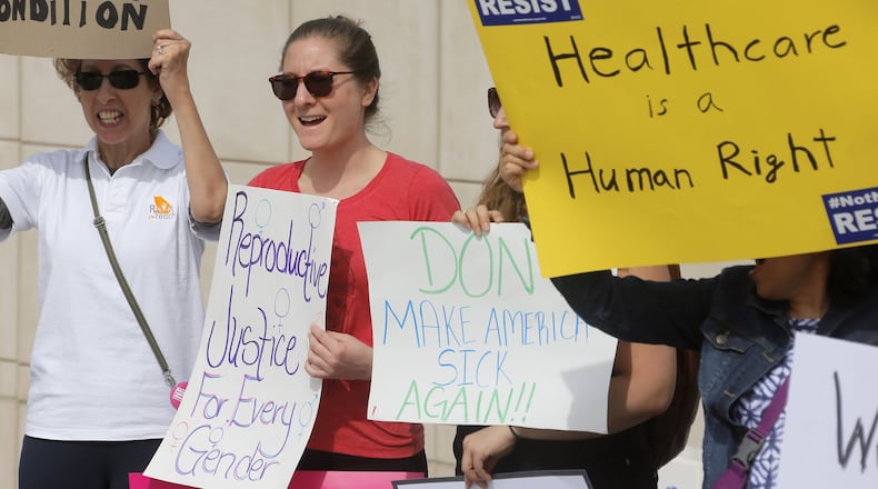 Feb. 20 2017 - Atlanta - Protestors cheered on the speakers during the rally. The “Save My Care Bus Tour” and Georgia Health Advocates rallied outside the Georgia State Capitol today in response to Republican plans to dismantle the Affordable Care Act. BOB ANDRES /BANDRES@AJC.COM