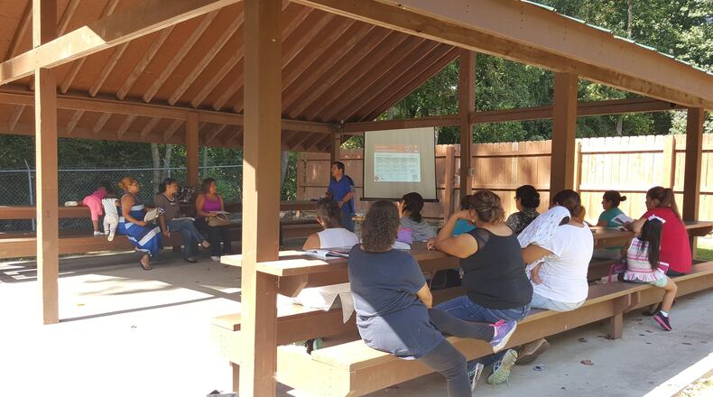 People at a Ser Familia event. HANDOUT