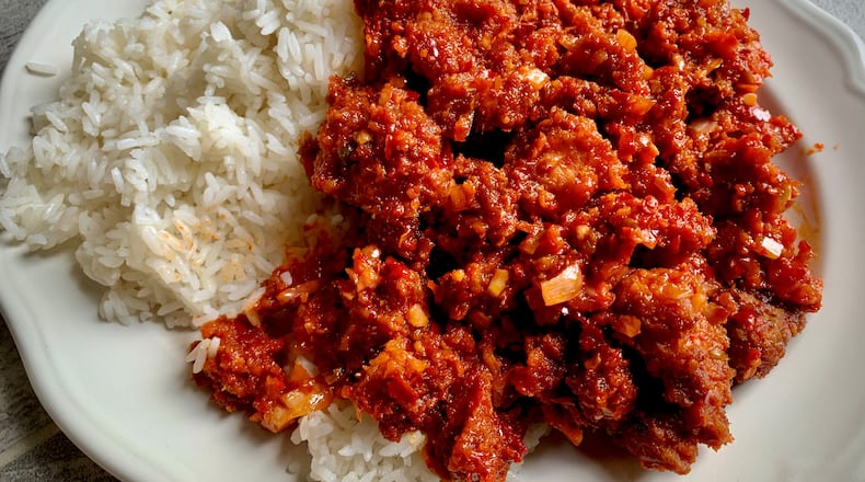 Chicken bullet from Chinese Dhaba shows you how simple flavors can be kicked up a few levels. Henri Hollis/henri.hollis@ajc.com