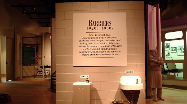 An exhibit at the Birmingham Civil Rights Institute in Birmingham, Ala., shows the color line established by Birmingham’s Jim Crow laws. Separate water fountains were designated for whites and blacks.