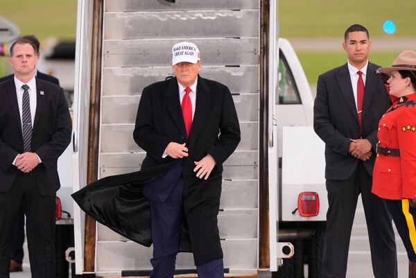 President Donald Trump arrives on Air Force One at Calgary International Airport, Sunday, June 15, 2025, in Calgary, Canada, ahead of the G7 Summit. (AP Photo/Gerald Herbert)