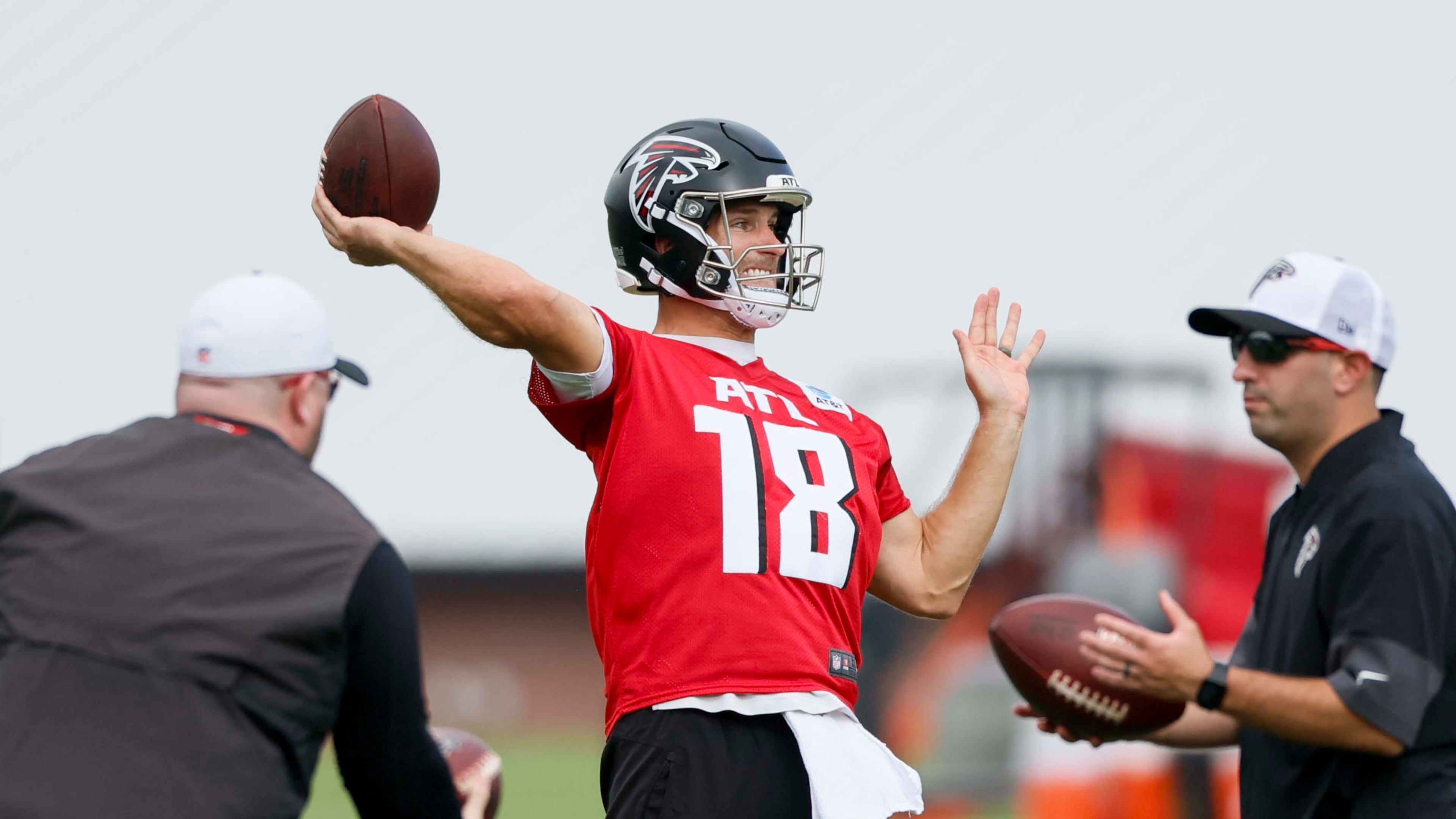 Atlanta Falcons quarterback Kirk Cousins attempts a pass during the first practice of training camp Thursday. (Miguel Martinez/AJC)