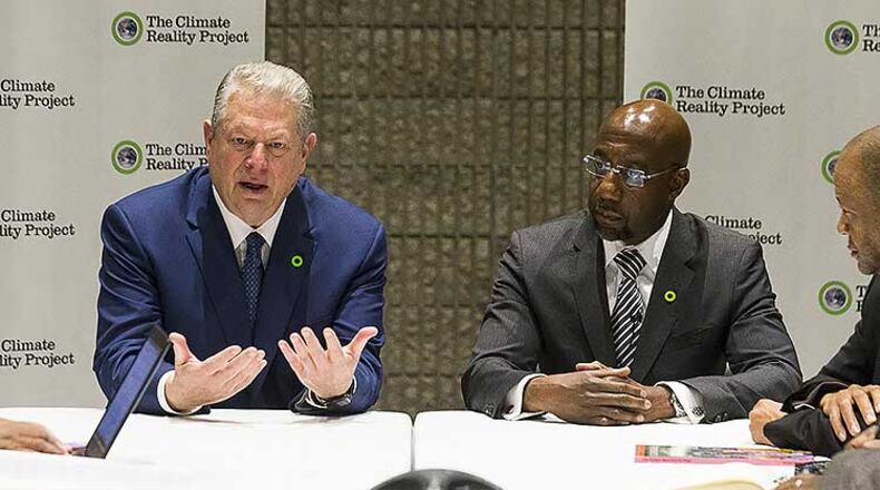 Former Vice President Al Gore and Atlanta's Ebenezer Baptist Church pastor, Reverend Raphael G. Warnock, speak with members of the media at a round table discussion during the Climate Reality Leadership Corps at Georgia World Congress Center in Atlanta.
