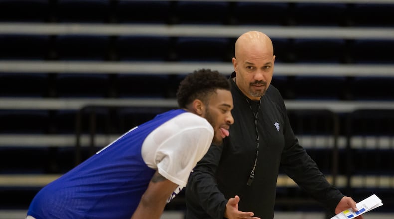 GSU's Damon Wilson (left) talks to coach Rob Lanier at a practice. File photo