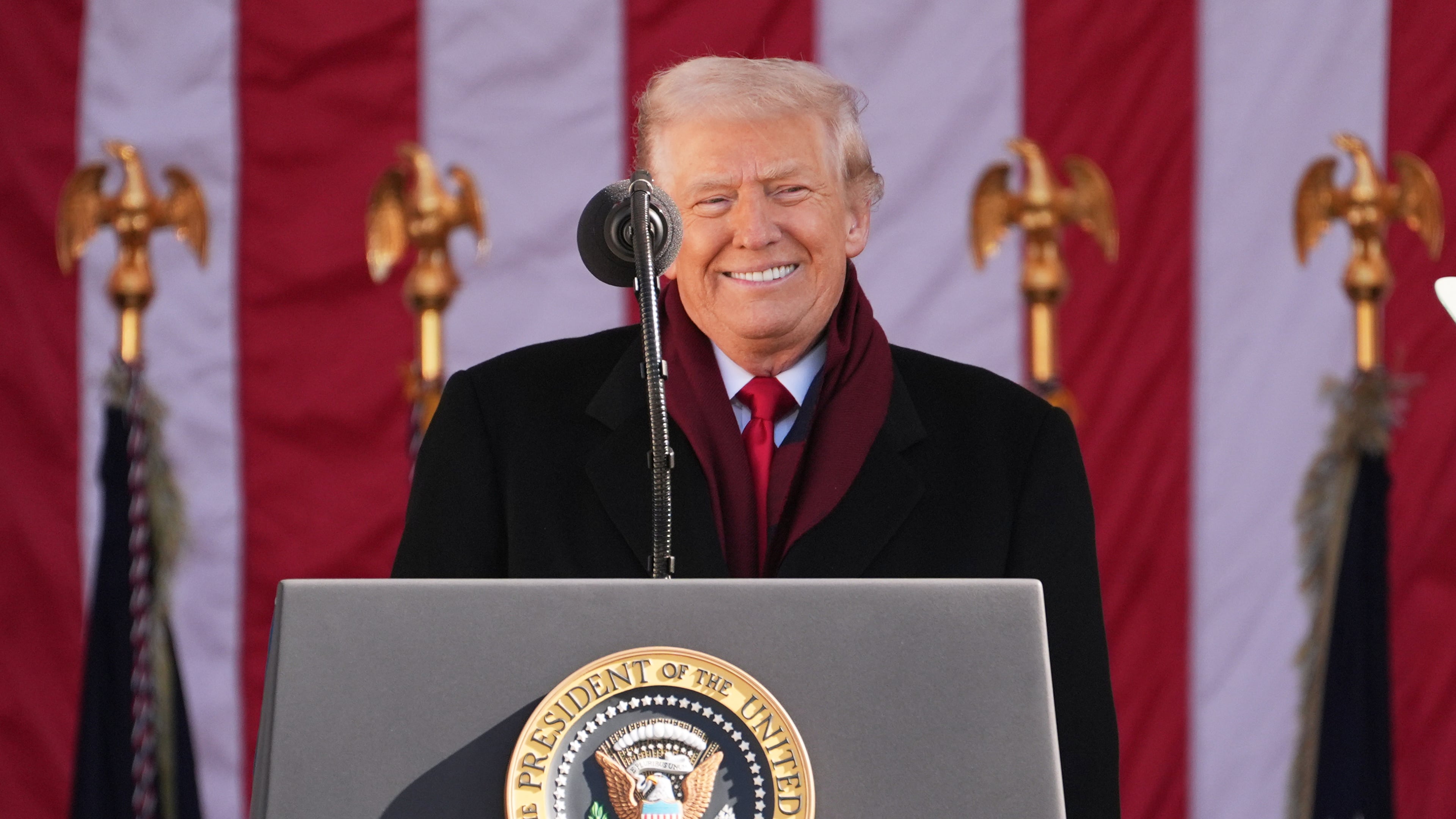 President Donald Trump speaks during an event to mark Veterans Day at Arlington National Cemetery, Tuesday, Nov. 11, 2025, in Arlington, Va. (AP Photo/Evan Vucci)