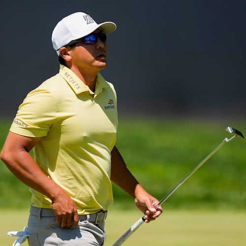 Kurt Kitayama walks across the first green after his shot during the third round of the PGA Championship golf tournament at Aronimink Golf Club, Saturday, May 16, 2026, in Newtown Square, PA. (AP Photo/Matt Slocum)