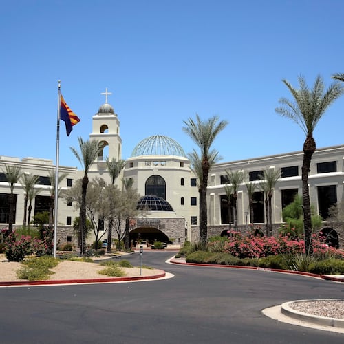 Mercy Gilbert Medical Center, shown here, where an 18-month-old toddler discovered in a backyard pool and taken to the hospital in February, was declared dead before being found breathing hours later in a room that serves as the hospital morgue, according to recently released police records, Monday, July 6, 2026, in Gilbert, Ariz. (AP Photo/Ross D. Franklin)