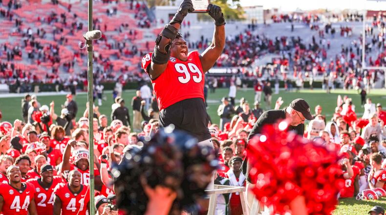 Georgia defensive lineman Jordan Davis (99) after the Bulldogs’ game against Charleston Southern on Dooley Field at Sanford Stadium in Athens, Ga., on Saturday, Nov. 20, 2021. Davis was made an honorary red coat member. (Photo by Mackenzie Miles)