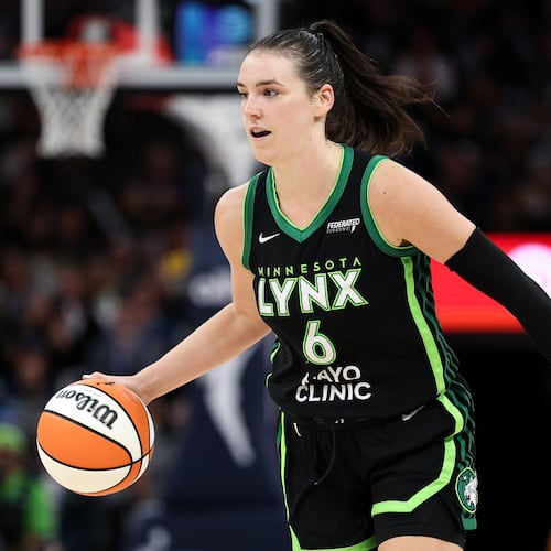 FILE - Minnesota Lynx forward Bridget Carleton (6) dribbles the ball up court against the Phoenix Mercury during the second half of Game 2 of a WNBA basketball playoff semifinals series Tuesday, Sept. 23, 2025, in Minneapolis. (AP Photo/Matt Krohn, File)