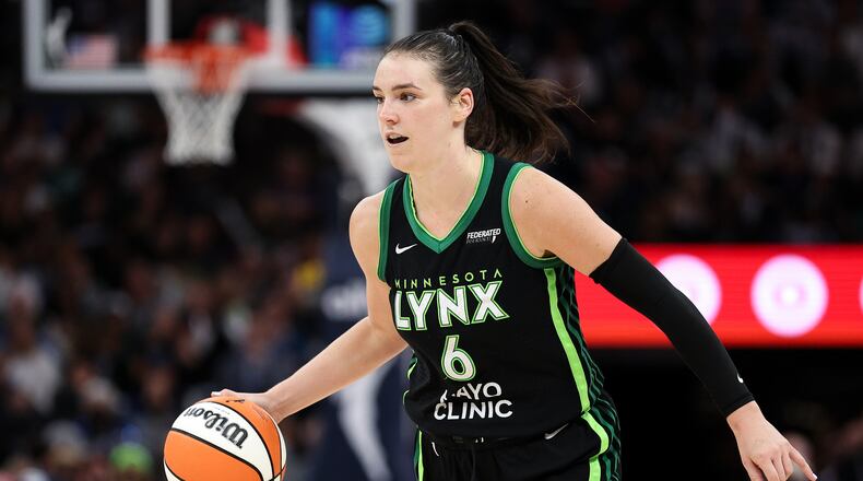FILE - Minnesota Lynx forward Bridget Carleton (6) dribbles the ball up court against the Phoenix Mercury during the second half of Game 2 of a WNBA basketball playoff semifinals series Tuesday, Sept. 23, 2025, in Minneapolis. (AP Photo/Matt Krohn, File)